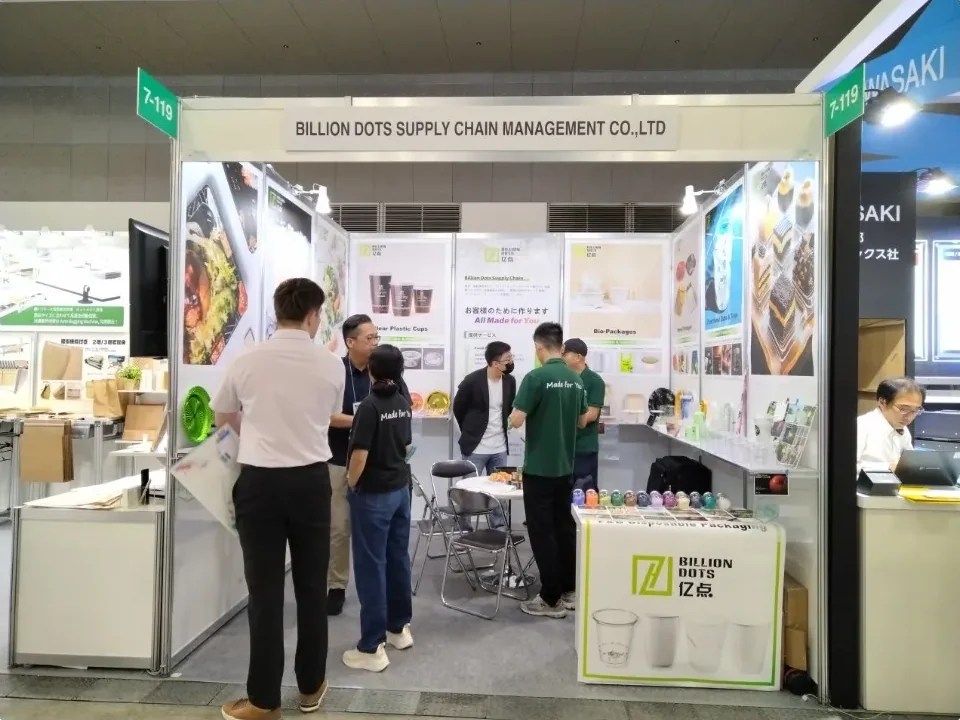 Billion Dots booth with the company name on the fascia and the Billion Dots 亿点 counter, the lead image from a 2026 Chinese media feature on the company