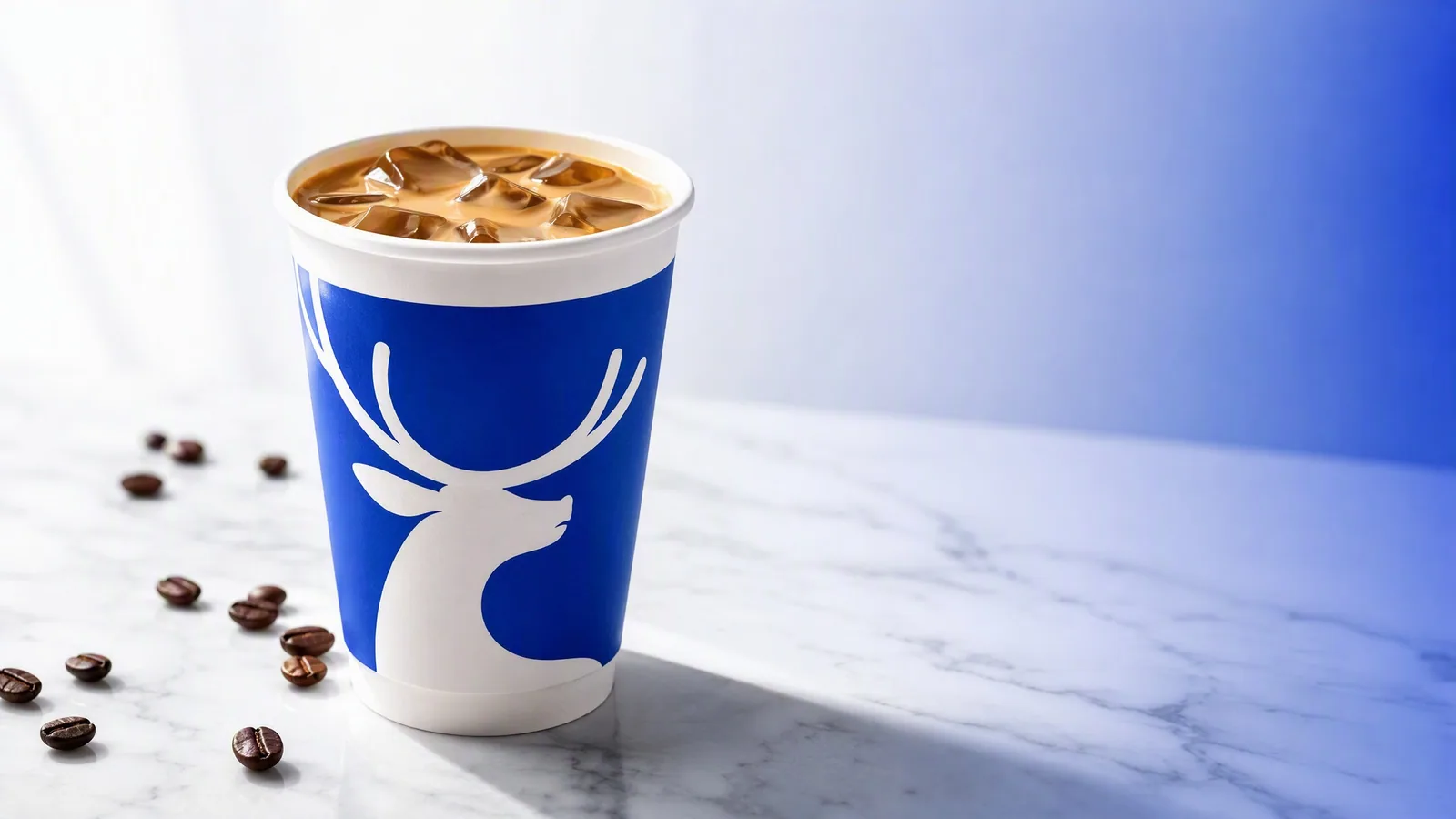 Iced coffee in a clear disposable cup — industry insight 2024